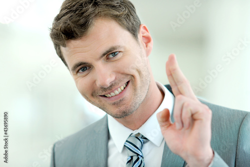 Foto: Portrait of cheerful businessman with successful and happy look Portrait of cheerful businessman with successful and happy look