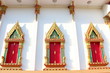 Photo: Native Thai style carving, painting on church door in the temple Native Thai style carving, painting on church door in the temple
