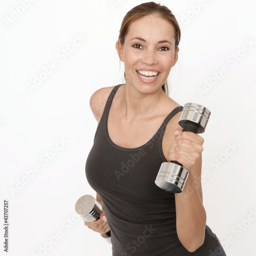 Photo: Sportübung mit Hanteln Sportübung mit Hanteln