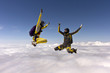 Photo: Skydivers in action. Skydivers in action.