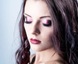 Photo: Bright purple eye evening make-up, beautiful woman portrait Bright purple eye evening make-up, beautiful woman portrait
