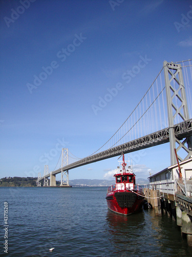 Photo: Fireboat docked in front of the San Francisco-Oakland Bay Bridge Fireboat docked in front of the San Francisco-Oakland Bay Bridge