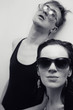 Young man and woman in sunglasses