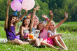 beautiful girls celebrate birthday outdoors