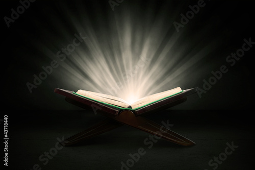 Photo: Holy quran with rays Holy quran with rays