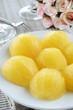 Photo: Ripe tangerines on white dish Ripe tangerines on white dish