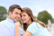 Photo: Couple of lovers in public park Couple of lovers in public park