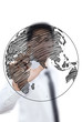 Businessman pushing World Map Globe line on the whiteboard.