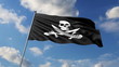 Pirate flag waving against clouds background