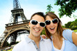 Funny couple in front of the Eiffel tower