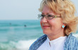 Photo: happy senior woman on summer vacation at sea happy senior woman on summer vacation at sea
