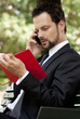 pensive man on the phone