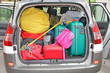 luggage in the family car ready for the holidays