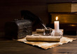 Photo: old papers and books on a wooden table old papers and books on a wooden table
