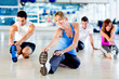 Photo: People stretching at the gym People stretching at the gym
