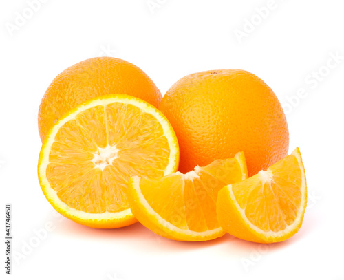 Photo: Sliced orange fruit segments isolated on white background Sliced orange fruit segments isolated on white background