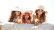 Little girls eating apples