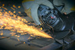 Worker cutting metal with many sharp sparks