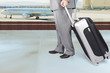 Photo: Traveling Businessman in the Airport Traveling Businessman in the Airport