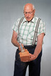aged mason cleaving a brick workmanlike