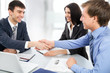 Photo: Business people shaking hands Business people shaking hands
