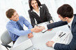 Photo: Business people shaking hands Business people shaking hands