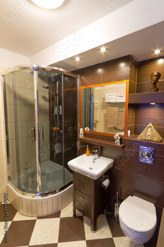 Photo: Modern brown bathroom interior Modern brown bathroom interior