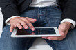 Foto: Man working on a tablet pc Man working on a tablet pc