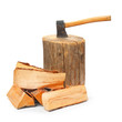 Cut logs fire wood and old axe. Renewable resource of a energy.