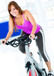 Gym woman doing spinning