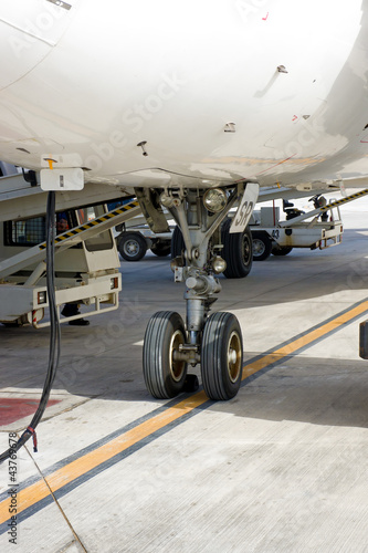 Photo: airplane tire in airport airplane tire in airport