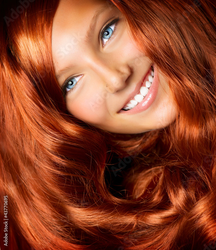 Photo: Hair. Beautiful Girl With Healthy Long Red Curly Hair Hair. Beautiful Girl With Healthy Long Red Curly Hair