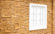 Photo: white window on the stone wall white window on the stone wall