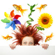 Photo: Scared woman with different object on her head Scared woman with different object on her head