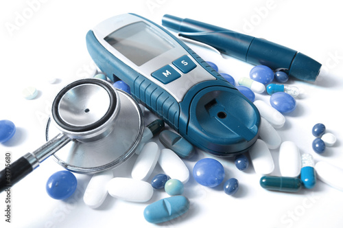 Photo: Device for measuring blood sugar level and pills Device for measuring blood sugar level and pills