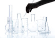 Set of empty laboratory flasks with reflection