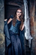 Portrait of a young witch. Halloween, horror.