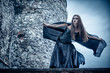 Photo: Portrait of a young witch. Halloween, horror. Portrait of a young witch. Halloween, horror.