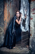 Portrait of a young witch. Halloween, horror.