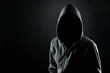 Silhouette of hooded man or hooligan