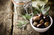Fresh black olives and herbs