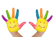Photo: two colorful hands with smile different colors of child as logo. two colorful hands with smile different colors of child as logo.