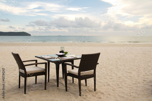 Photo: Dining table on beach Dining table on beach
