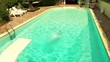 Video: boy diving and swimming into pool boy diving and swimming into pool