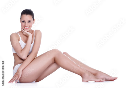 Photo: Woman satisfied with her skin Woman satisfied with her skin