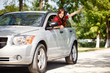 Happy woman in car