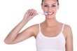 woman brushing her teeth