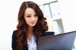 Young busines woman with notebook