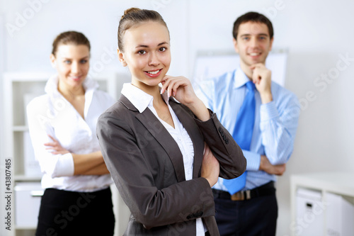 Photo: Young business people working together Young business people working together