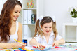 Mother and daughter studying